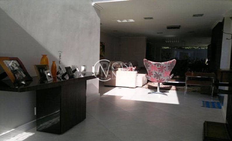 Casa de Condomínio à venda com 3 quartos, 380m², 3 suítes, 3 vagas, Rua Tocantins no bairro Lomba do Pinheiro em Porto Alegre