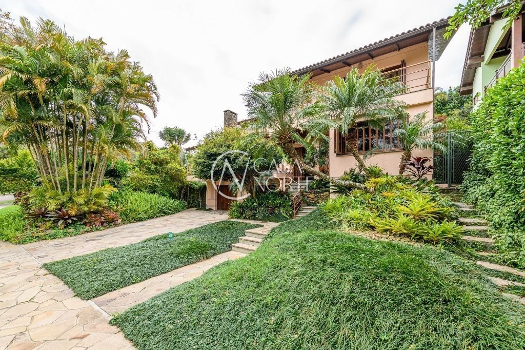 Casa de Condomínio à venda com 5 quartos, 420m², 2 suítes, 6 vagas, Avenida Firmino Octávio Bimbi no bairro Cavalhada em Porto Alegre