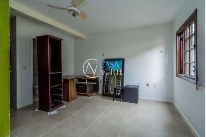 Casa de Condomínio à venda com 3 quartos, 72m², 1 vaga, Avenida Monte Cristo no bairro Vila Nova em Porto Alegre