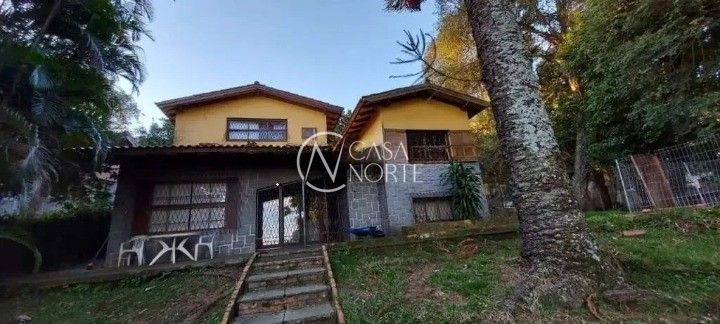 Casa à venda com 3 quartos, 250m², 1 suíte, 3 vagas, Rua Professor Xavier Simões no bairro Sétimo Céu em Porto Alegre