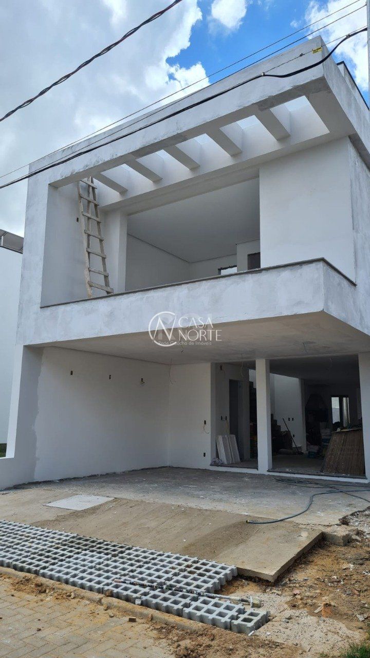 Casa de Condomínio à venda com 3 quartos, 203m², 3 suítes, 2 vagas, Rua Sinai no bairro Ipanema em Porto Alegre