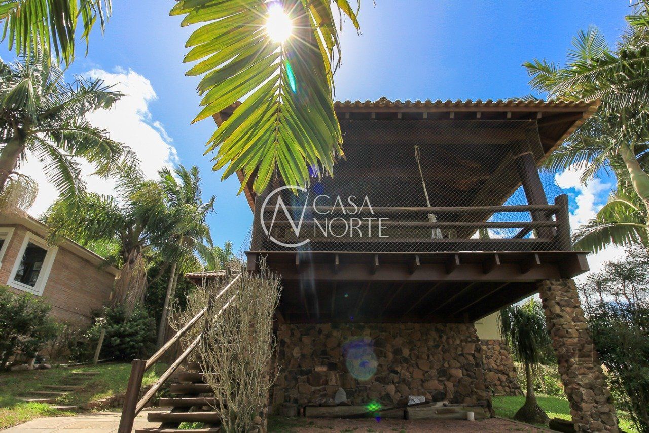 Casa de Condomínio à venda com 3 quartos, 248m², 3 suítes, 4 vagas, Estrada Jorge Pereira Nunes no bairro Campo Novo em Porto Alegre