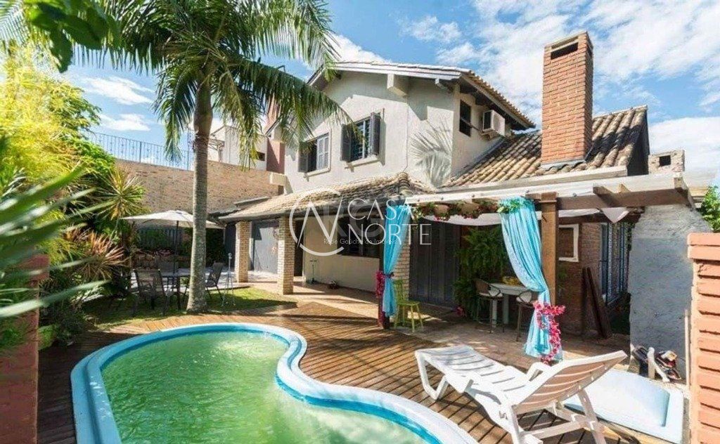 Casa de Condomínio à venda com 3 quartos, 180m², 2 suítes, 3 vagas, Estrada João Passuelo no bairro Vila Nova em Porto Alegre