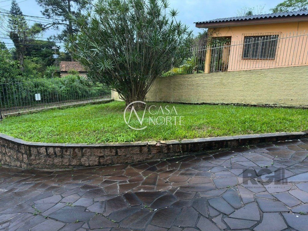 Casa à venda com 3 quartos, 129m², 1 suíte, 2 vagas, Rua Natércia Cunha Veloso no bairro Morro Santana em Porto Alegre