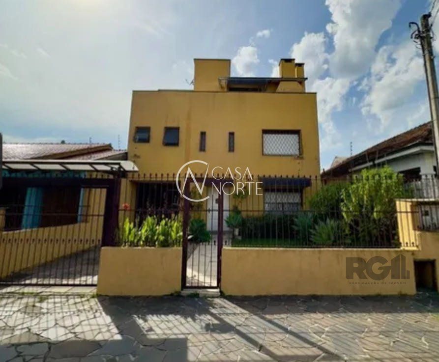 Casa à venda com 3 quartos, 308m², 3 suítes, 3 vagas, Rua Monteiro Lobato no bairro Partenon em Porto Alegre