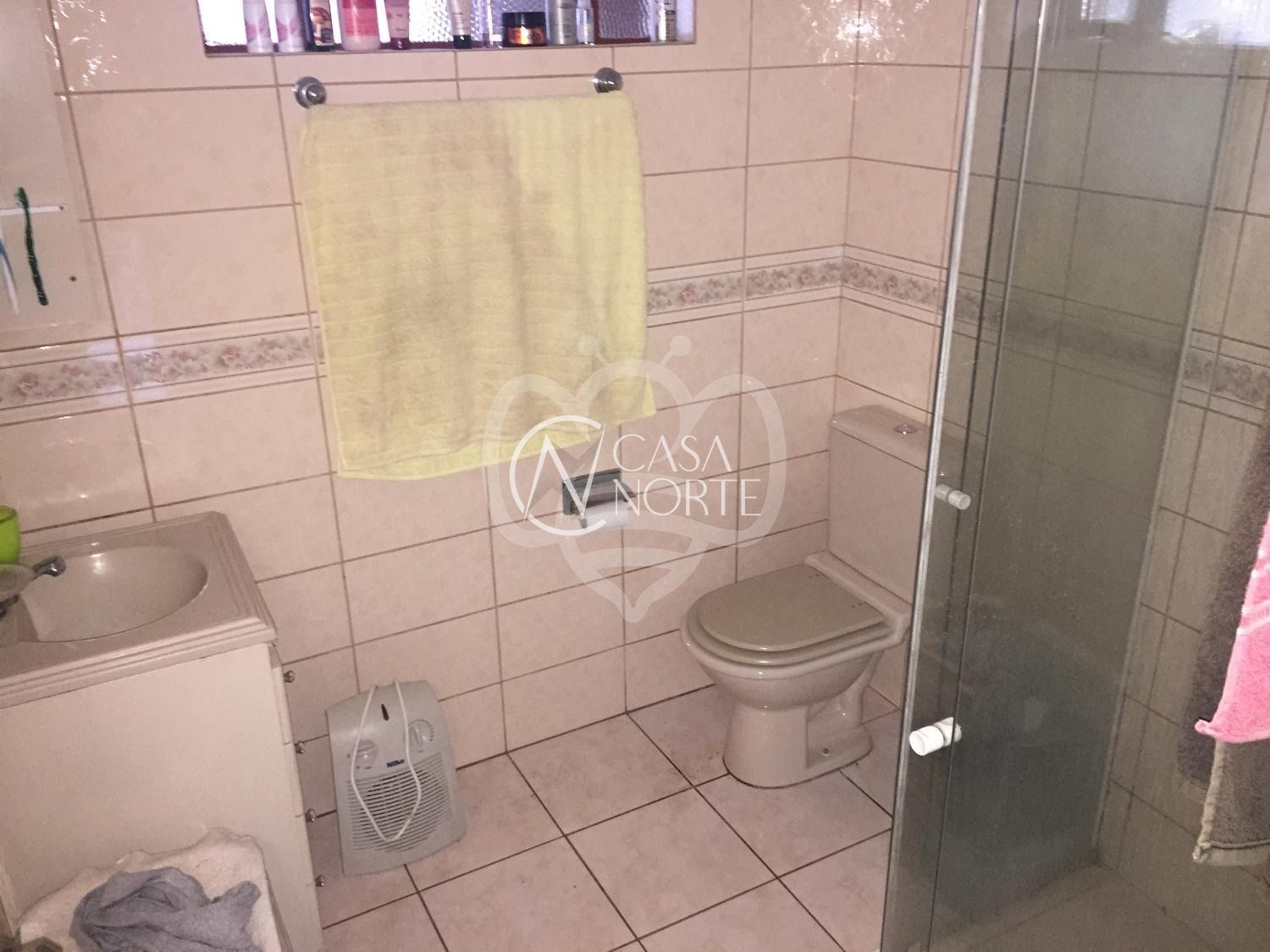 Casa à venda com 4 quartos, 265m², 5 vagas, Rua Adroaldo Novo Correa no bairro Cavalhada em Porto Alegre