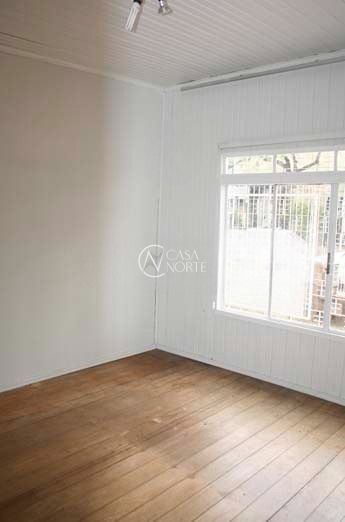 Casa à venda com 3 quartos, 210m², 2 vagas, Travessa Padre Henrique Koehler no bairro Anchieta em Porto Alegre