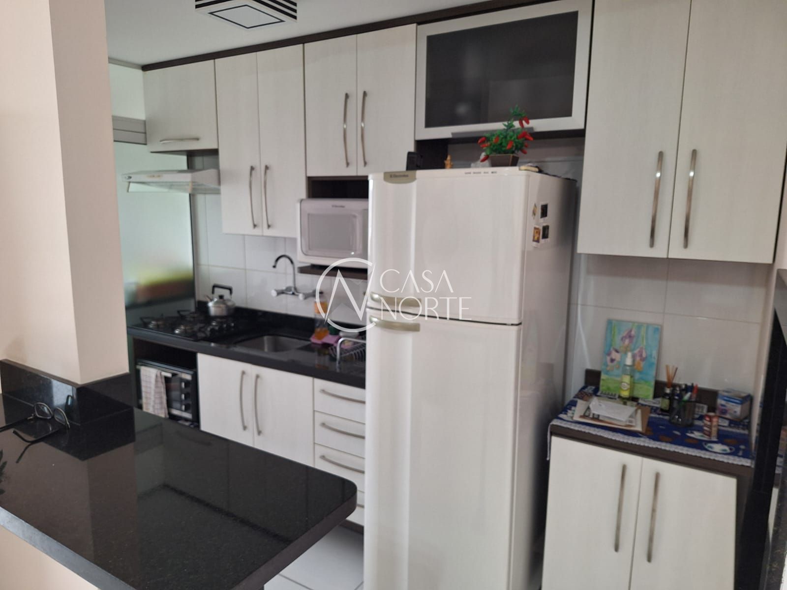 Apartamento à venda com 2 quartos, 59m², 1 suíte, 1 vaga, Rua Portuguesa no bairro Partenon em Porto Alegre