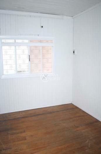 Casa à venda com 3 quartos, 210m², 2 vagas, Travessa Padre Henrique Koehler no bairro Anchieta em Porto Alegre