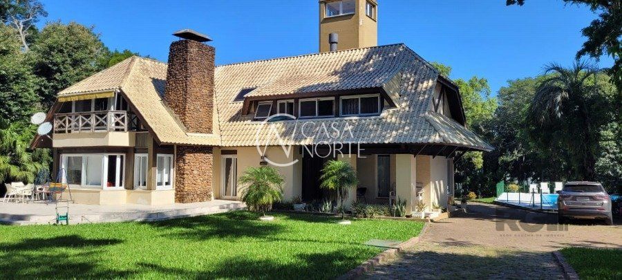 Casa à venda com 4 quartos, 500m², 4 suítes, 20 vagas, Estrada Retiro da Ponta Grossa no bairro Ponta Grossa em Porto Alegre