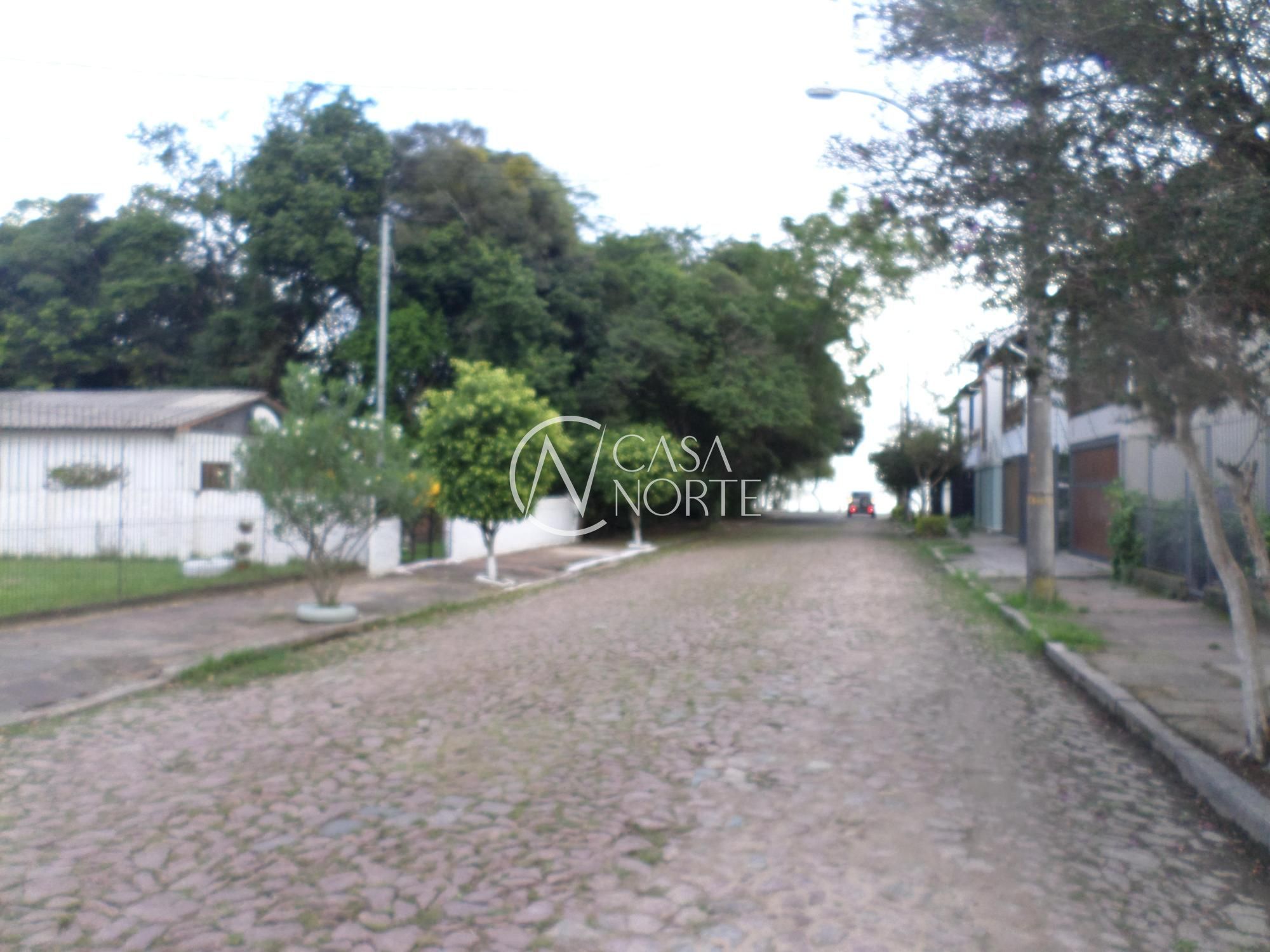 Casa à venda com 7 quartos, 350m², 4 suítes, 8 vagas, Rua Engenheiro Tito Marques Fernandes no bairro Ipanema em Porto Alegre