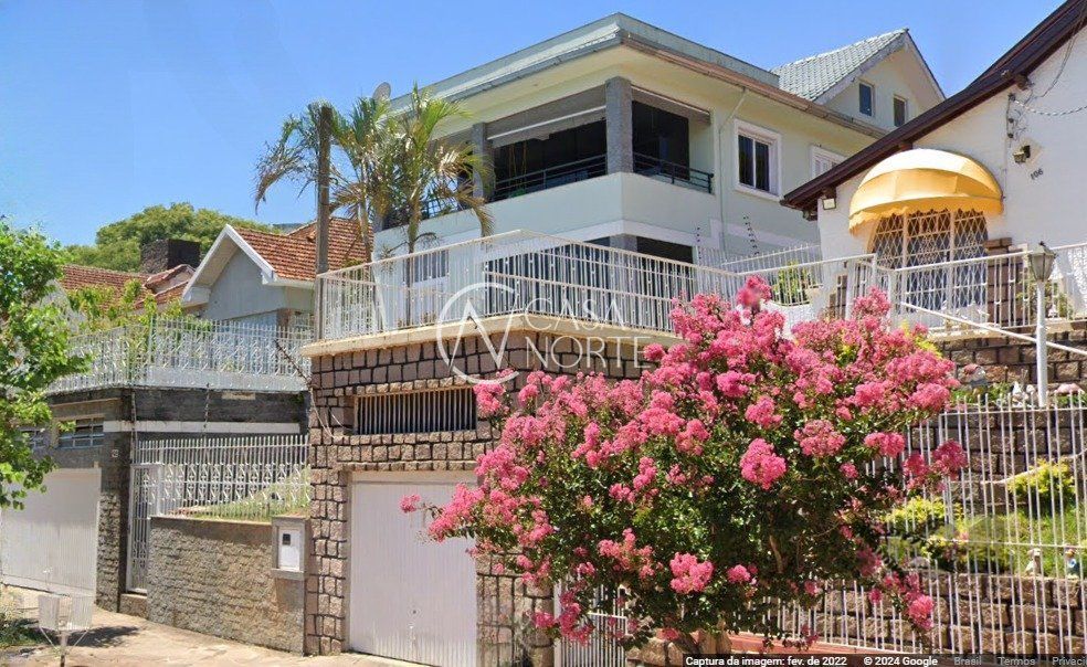 Casa à venda com 4 quartos, 167m², 2 suítes, 2 vagas, Rua Oscar Tollens no bairro Santa Tereza em Porto Alegre