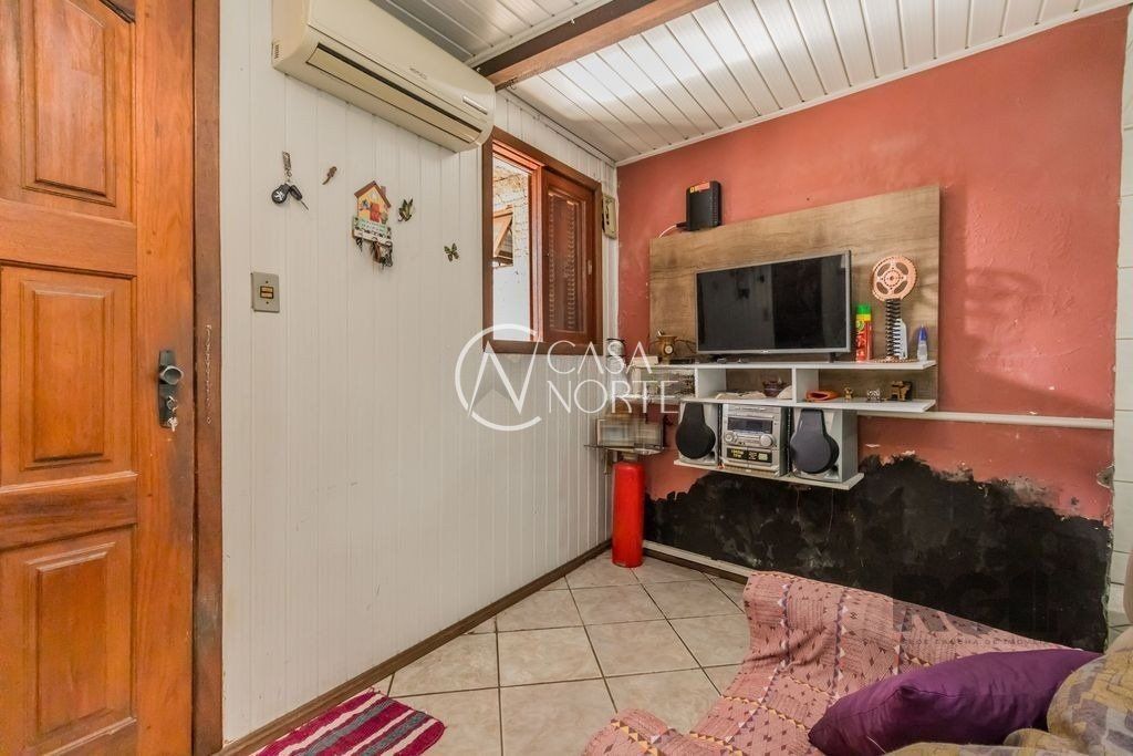 Casa à venda com 4 quartos, 224m², 2 vagas, Avenida Ipê no bairro Vila Jardim em Porto Alegre