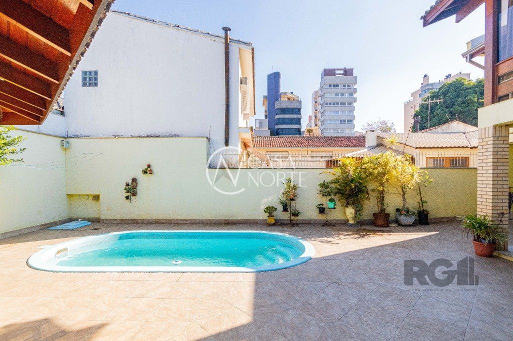 Casa à venda com 4 quartos, 304m², 2 suítes, 3 vagas, Travessa Porto Príncipe no bairro Jardim Lindóia em Porto Alegre