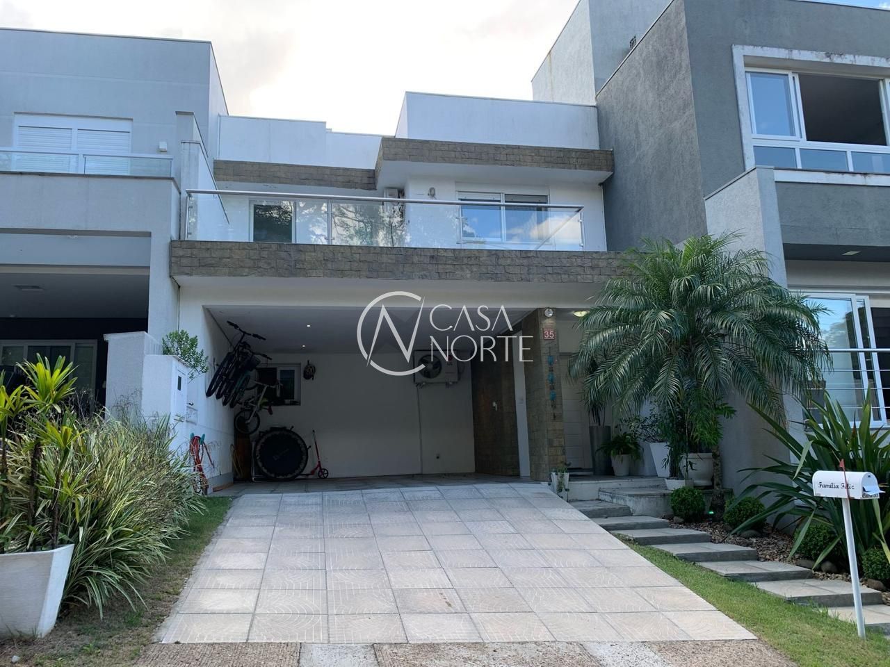 Casa de Condomínio à venda com 3 quartos, 195m², 1 suíte, 4 vagas, Rua Adriano Pereira da Silva no bairro Vila Nova em Porto Alegre