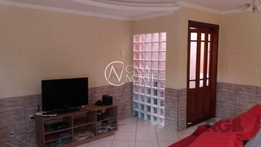 Casa à venda com 3 quartos, 178m², 1 suíte, 3 vagas, Rua Dinarte de Albuquerque no bairro Parque Santa Fé em Porto Alegre