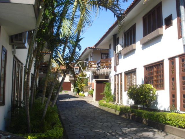 Casa de Condomínio à venda com 3 quartos, 132m², 2 vagas, Rua Doutor Mário Totta no bairro Tristeza em Porto Alegre