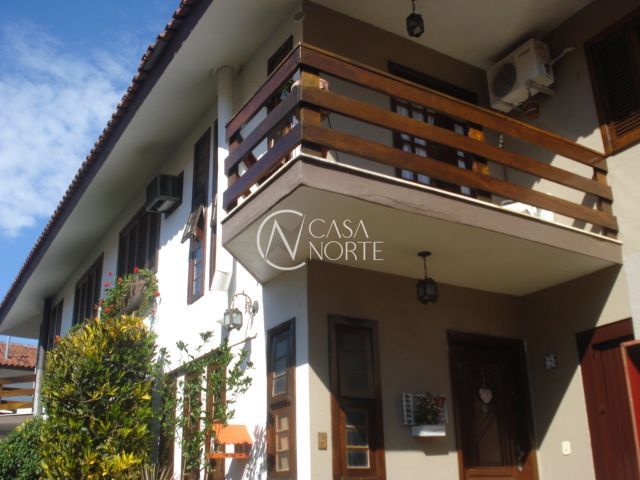 Casa de Condomínio à venda com 3 quartos, 132m², 2 vagas, Rua Doutor Mário Totta no bairro Tristeza em Porto Alegre