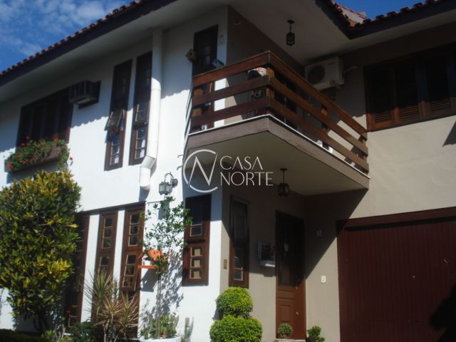 Casa de Condomínio à venda com 3 quartos, 132m², 2 vagas, Rua Doutor Mário Totta no bairro Tristeza em Porto Alegre