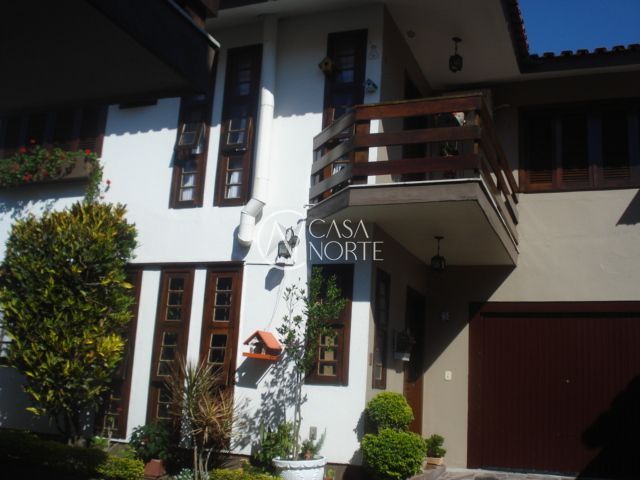 Casa de Condomínio à venda com 3 quartos, 132m², 2 vagas, Rua Doutor Mário Totta no bairro Tristeza em Porto Alegre