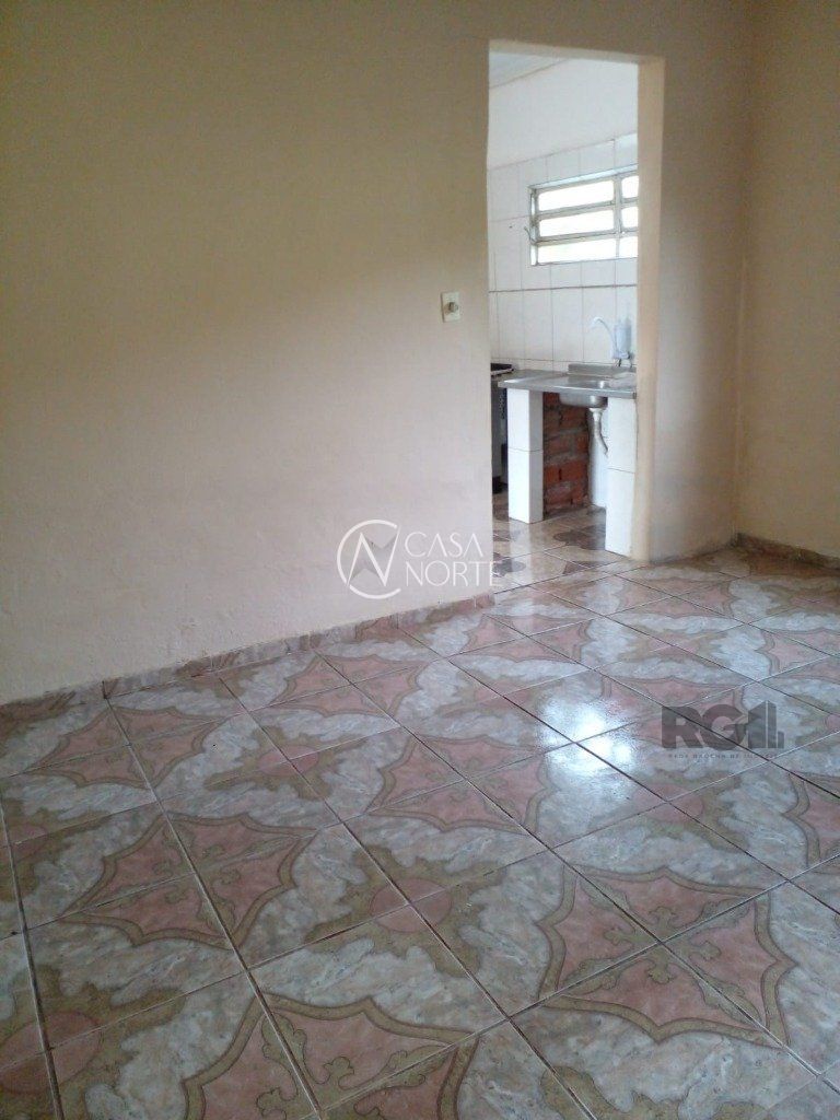 Casa à venda com 4 quartos, 146m², 4 vagas, Rua Josue Costalunga no bairro Cavalhada em Porto Alegre