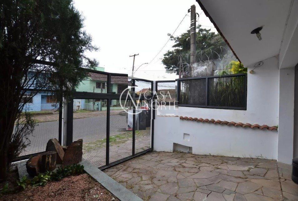 Casa à venda com 4 quartos, 267m², 1 suíte, 2 vagas, Rua Doutor Pereira Neto no bairro Tristeza em Porto Alegre