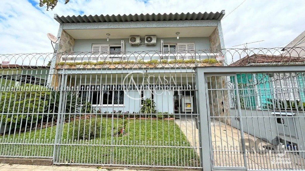 Casa à venda com 3 quartos, 292m², 1 suíte, 3 vagas, Rua Arnaldo Ballve no bairro Jardim Itu em Porto Alegre