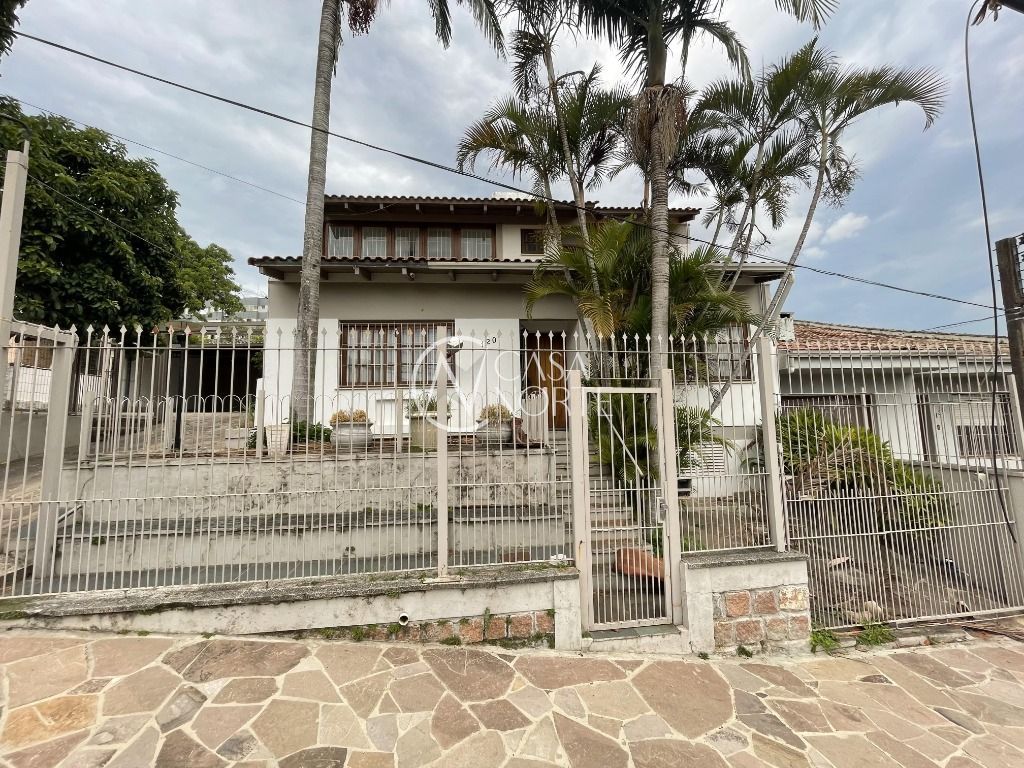 Casa à venda com 6 quartos, 486m², 1 suíte, 5 vagas, Rua João Bonuma no bairro Partenon em Porto Alegre