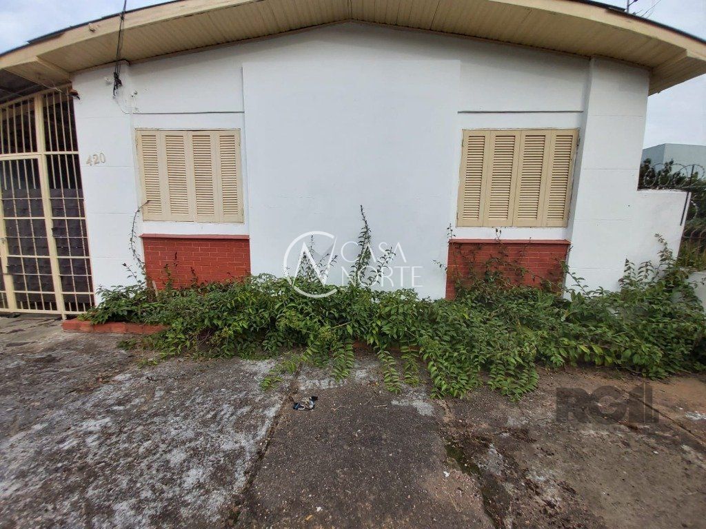 Casa à venda com 2 quartos, 1234m², 5 vagas, Rua Dário Totta no bairro Teresópolis em Porto Alegre