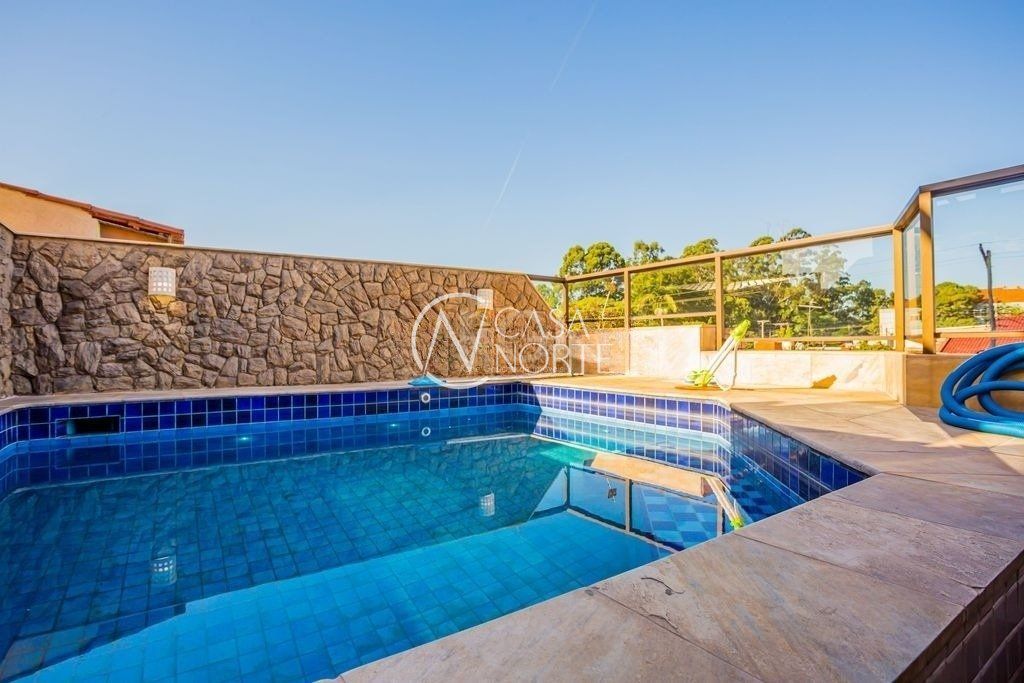 Casa à venda com 4 quartos, 375m², 1 suíte, 6 vagas, Rua Doutor Derly Monteiro no bairro Jardim Itu em Porto Alegre