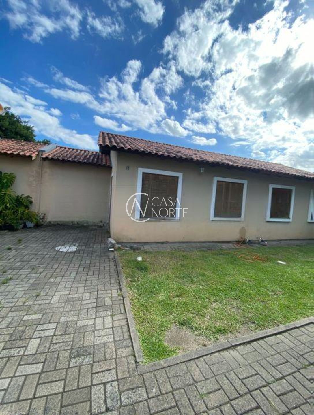 Casa de Condomínio à venda com 2 quartos, 94m², 1 vaga, Rua das Espatódeas no bairro Ponta Grossa em Porto Alegre