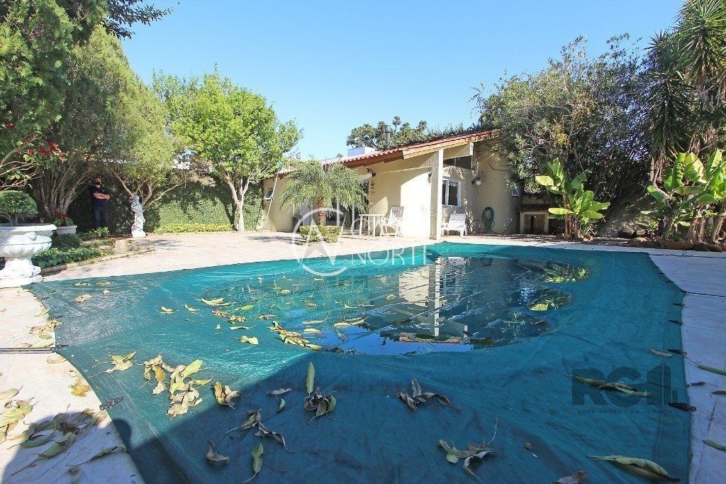 Casa à venda com 5 quartos, 230m², 1 suíte, 2 vagas, Avenida Engenheiro Ludolfo Boehl no bairro Teresópolis em Porto Alegre