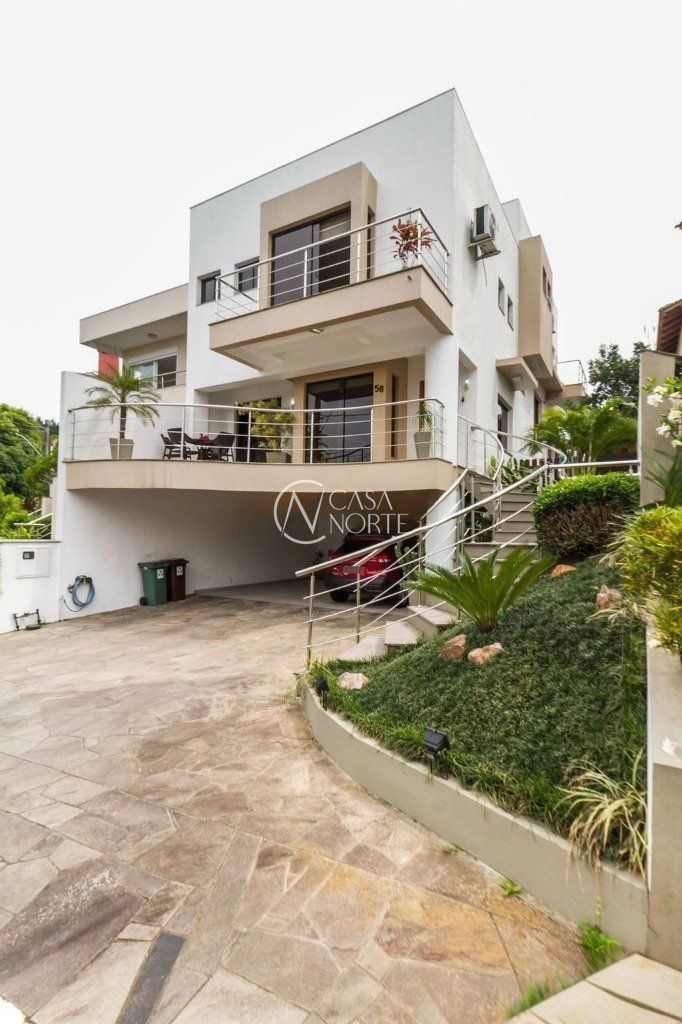 Casa de Condomínio à venda com 3 quartos, 234m², 3 suítes, 3 vagas, Rua Avenida Edgar Pires de Castro - de 1740 a 2238 - Lado Par no bairro Hípica em Porto Alegre