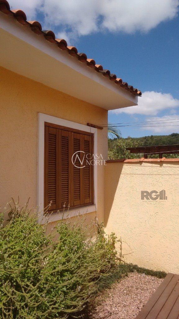 Casa à venda com 3 quartos, 67m², 2 vagas, Rua Alexio Fagherazzi no bairro Aberta dos Morros em Porto Alegre