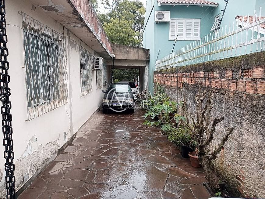 Casa à venda com 4 quartos, 160m², 2 vagas, Rua Alberto Silva no bairro Vila Ipiranga em Porto Alegre