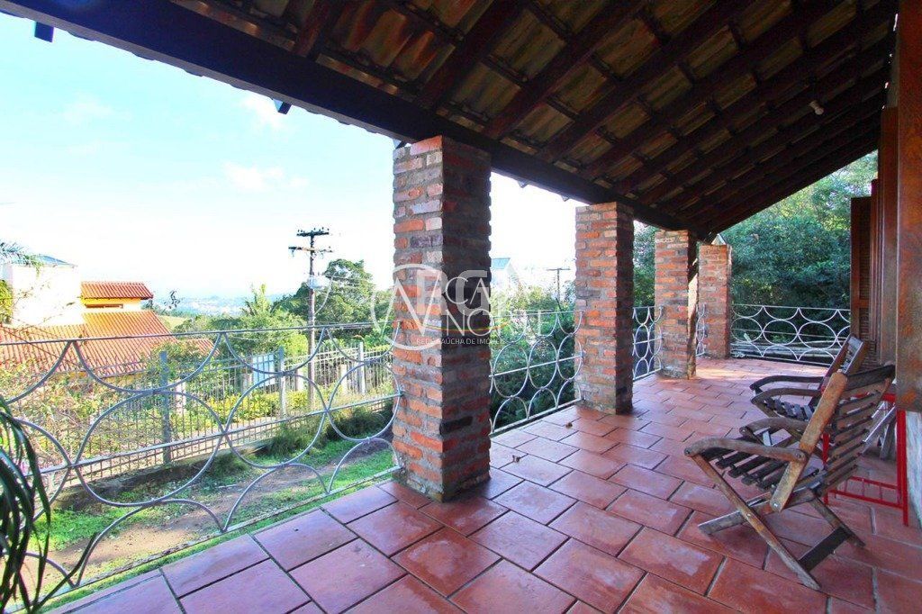 Casa à venda com 4 quartos, 269m², 2 suítes, 5 vagas, Rua Dona Lida Monteiro no bairro Teresópolis em Porto Alegre