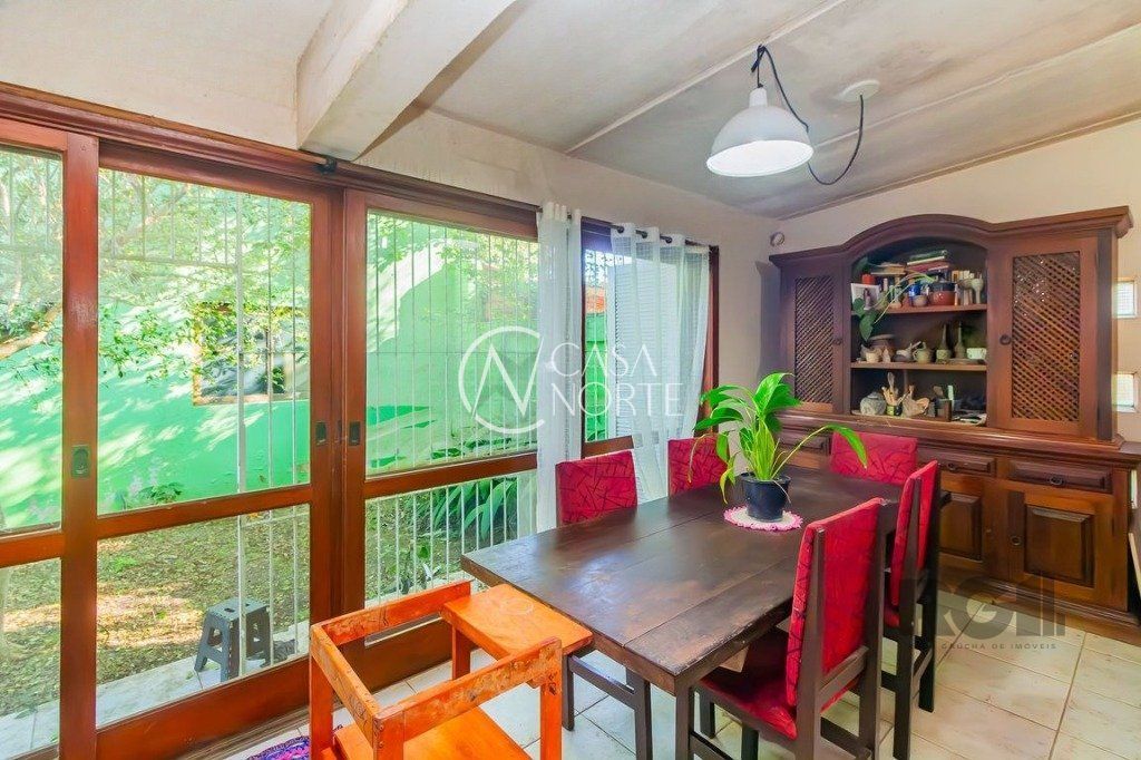 Casa à venda com 4 quartos, 213m², 2 vagas, Rua Jorge Mello Guimarães no bairro Belém Novo em Porto Alegre