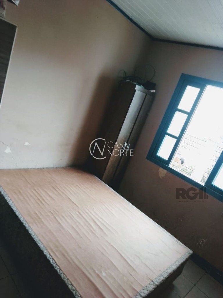 Casa à venda com 2 quartos, 84m², 1 vaga, Rua Eva Vargas Soares no bairro Hípica em Porto Alegre