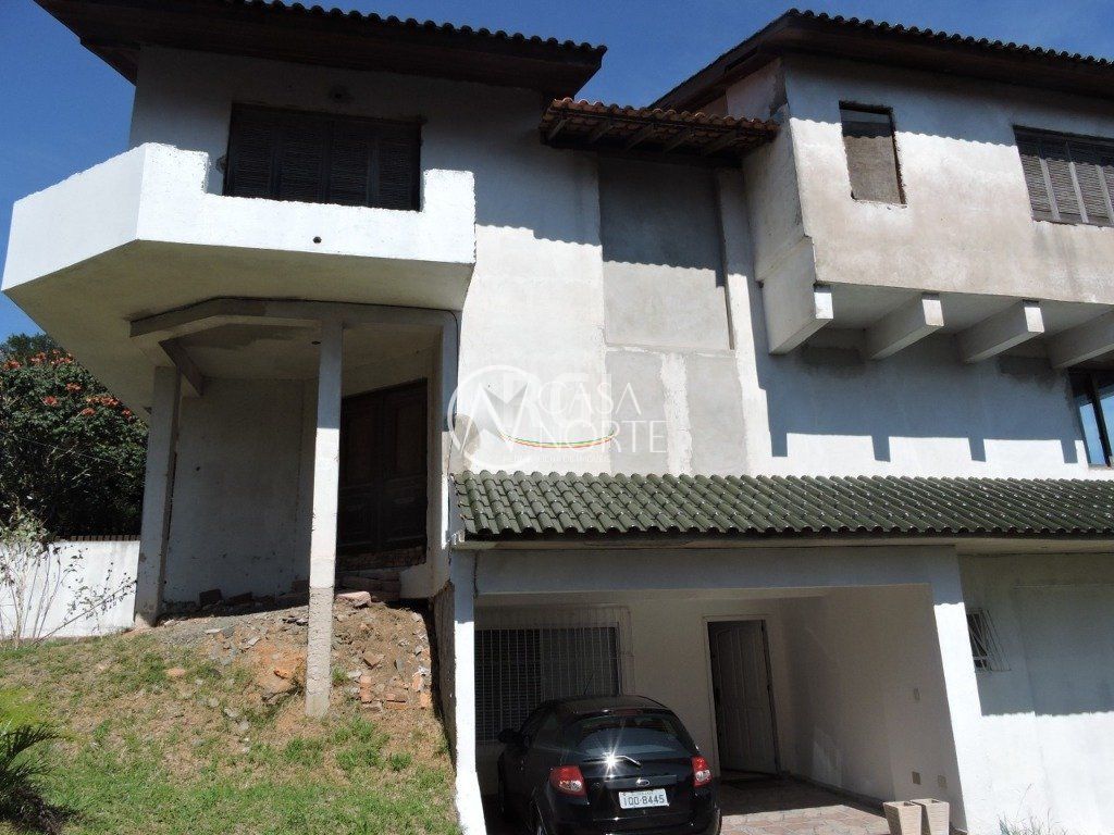 Casa à venda com 5 quartos, 300m², 3 suítes, 5 vagas, Rua Dona Lida Monteiro no bairro Teresópolis em Porto Alegre