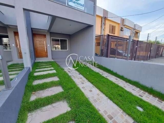 Casa à venda com 3 quartos, 122m², 1 suíte, 2 vagas, Rua Itacyr Rossi no bairro Guarujá em Porto Alegre