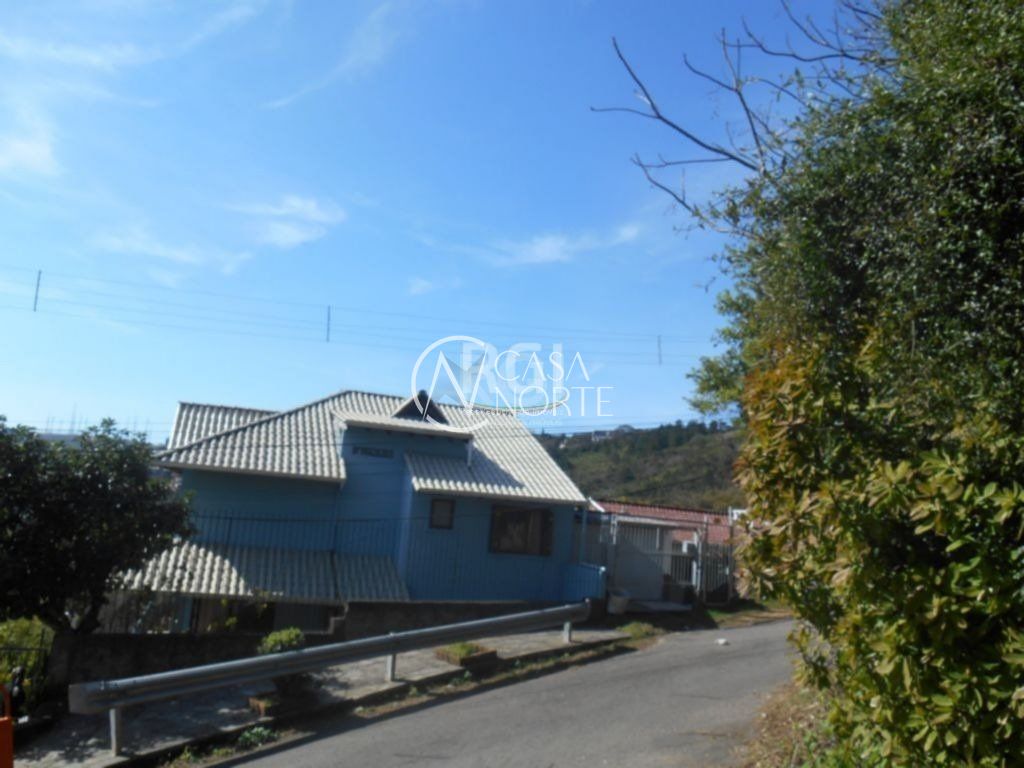 Casa à venda com 4 quartos, 185m², 2 suítes, 4 vagas, Rua Taveira Junior no bairro Nonoai em Porto Alegre