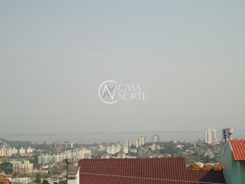 Casa à venda com 4 quartos, 365m², 2 suítes, 6 vagas, Rua Alcebiades Antônio dos Santos no bairro Nonoai em Porto Alegre