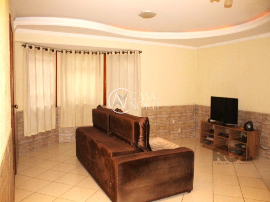 Casa à venda com 3 quartos, 178m², 1 suíte, 3 vagas, Rua Dinarte de Albuquerque no bairro Parque Santa Fé em Porto Alegre