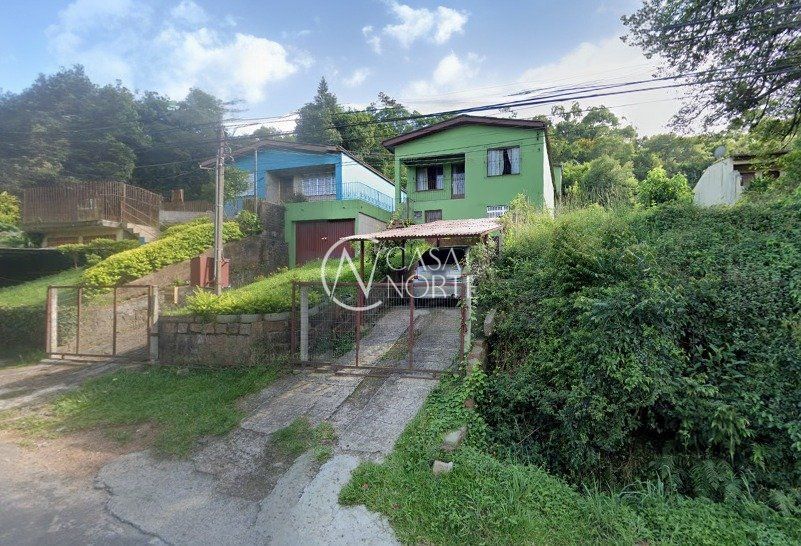 Casa à venda com 5 quartos, 280m², 2 vagas, Avenida Professor Oscar Pereira no bairro Cascata em Porto Alegre