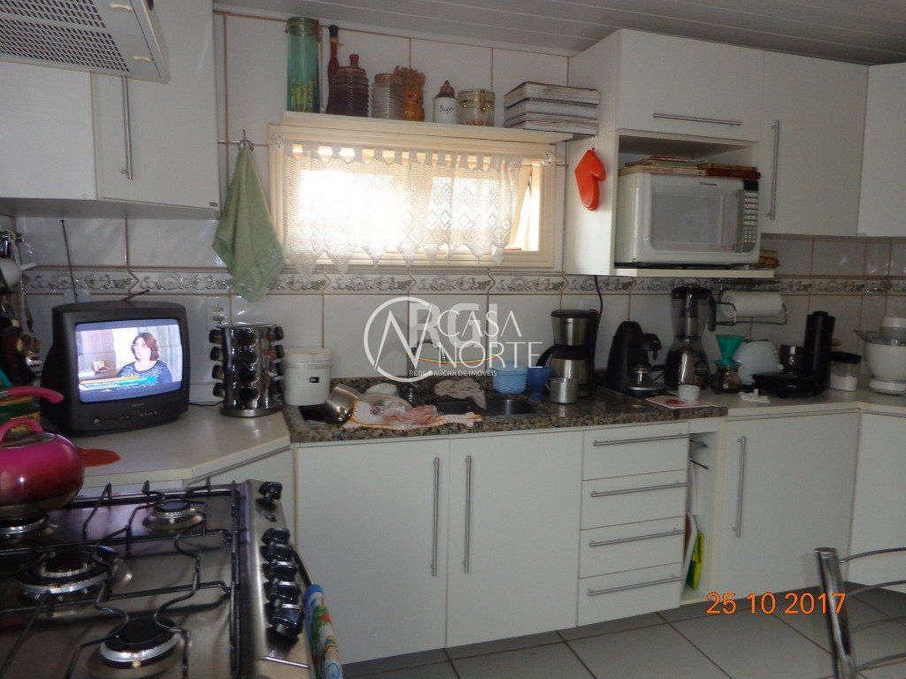 Casa à venda com 2 quartos, 102m², 1 suíte, 1 vaga, Rua Cachoeira no bairro Nonoai em Porto Alegre