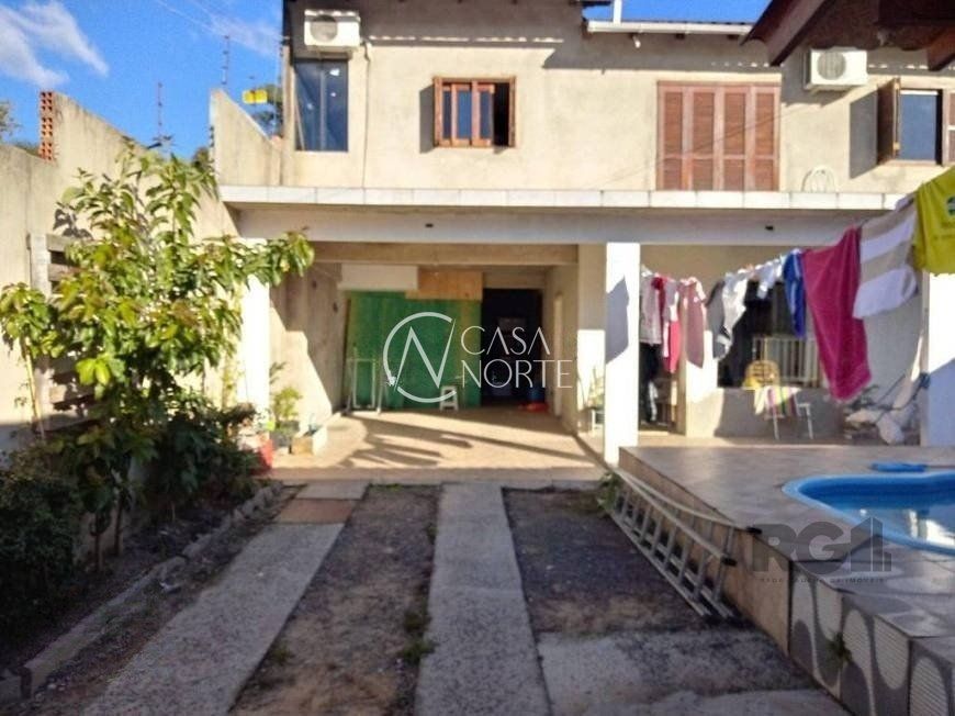 Casa à venda com 4 quartos, 191m², 1 suíte, 4 vagas, Rua Amadeu Amaral no bairro Vila São José em Porto Alegre