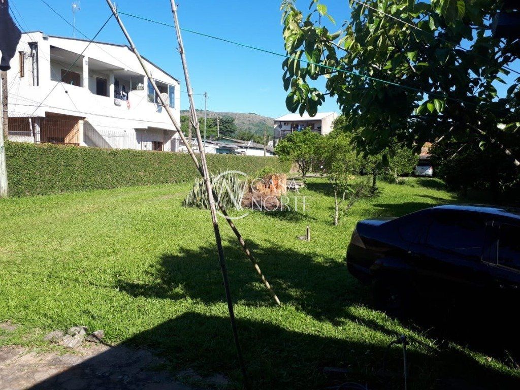 Casa à venda com 2 quartos, 69m², 5 vagas, Rua Rio Grande no bairro Vila Nova em Porto Alegre