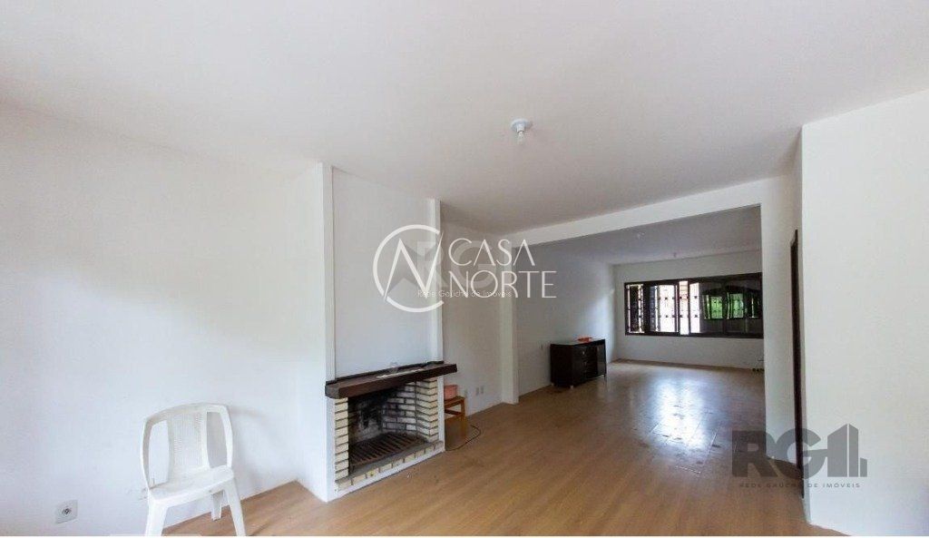 Casa à venda com 4 quartos, 450m², 3 suítes, 5 vagas, Rua Marcio Dias no bairro Nonoai em Porto Alegre