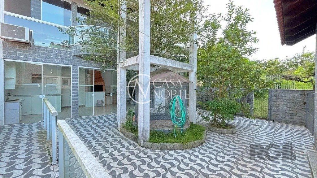 Casa à venda com 3 quartos, 228m², 1 suíte, 3 vagas, Avenida Celestino Bertolucci no bairro Aberta dos Morros em Porto Alegre