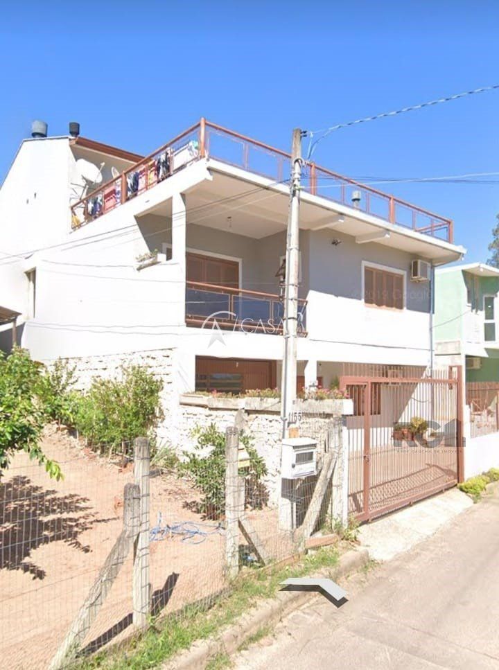 Casa à venda com 4 quartos, 360m², 2 suítes, 2 vagas, Estrada Aracaju no bairro Vila Nova em Porto Alegre